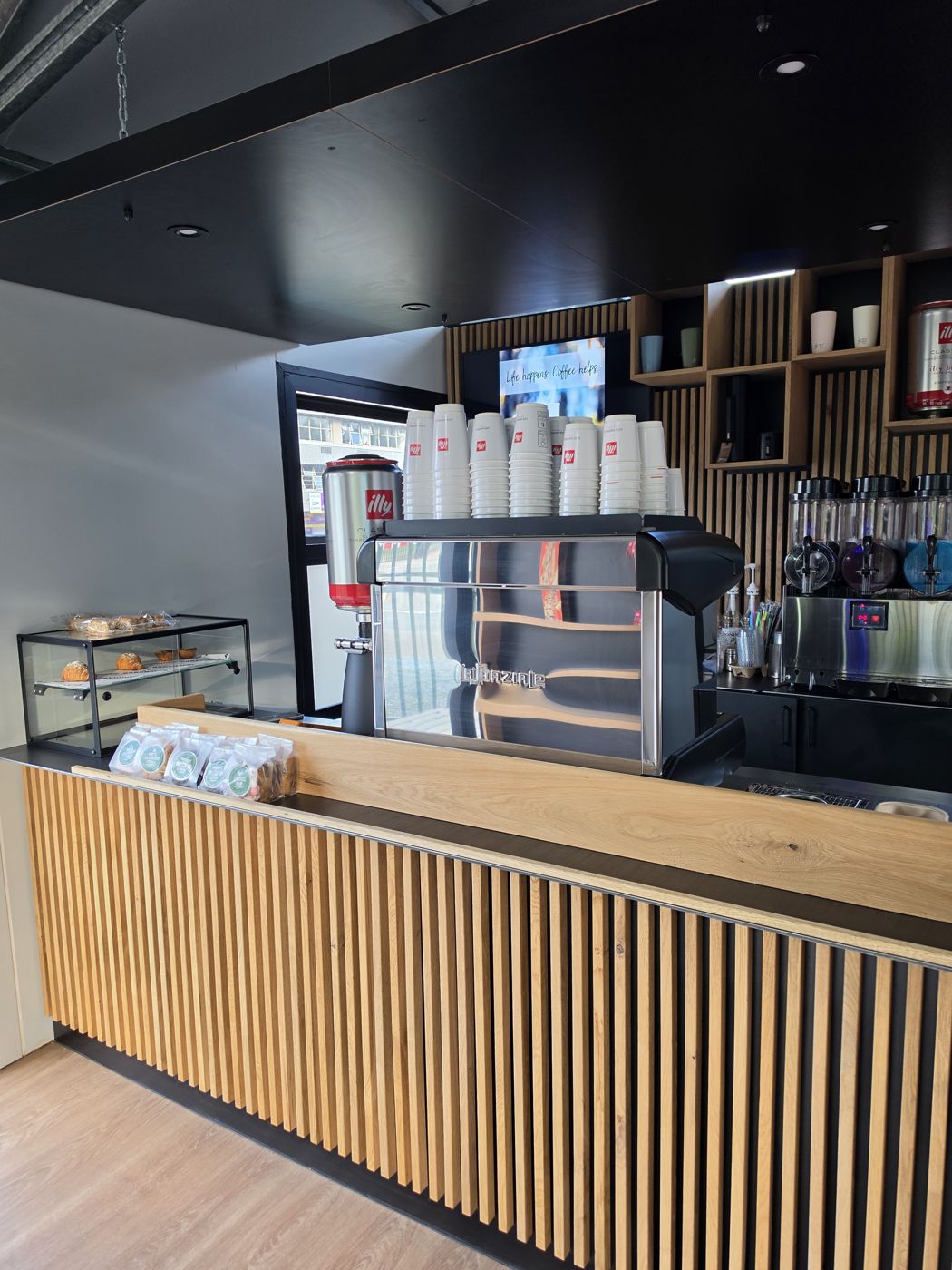 Pastry case and counter at Tiny Town Café